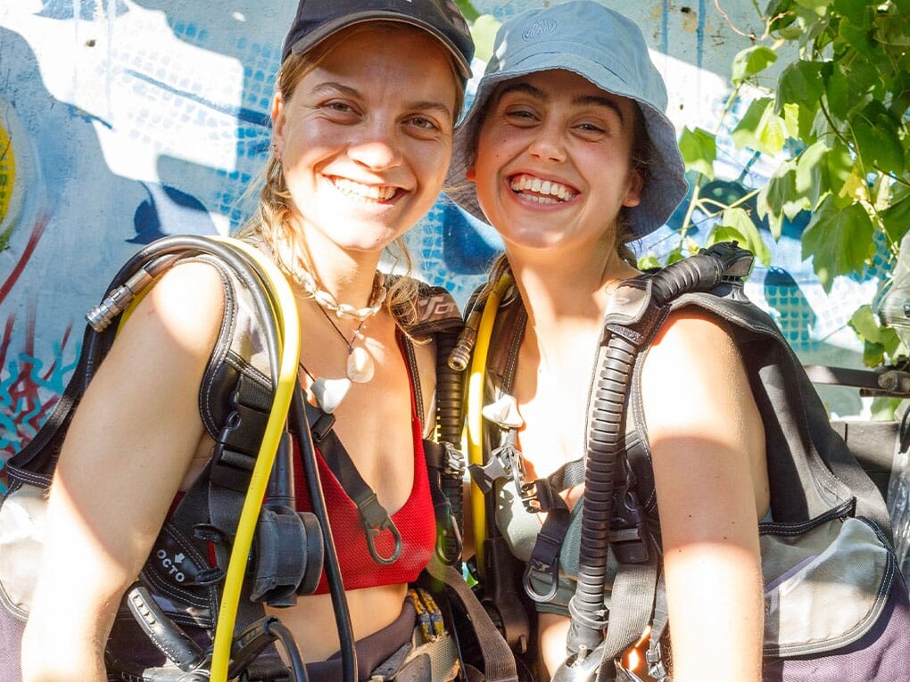 couple of scuba divers uai