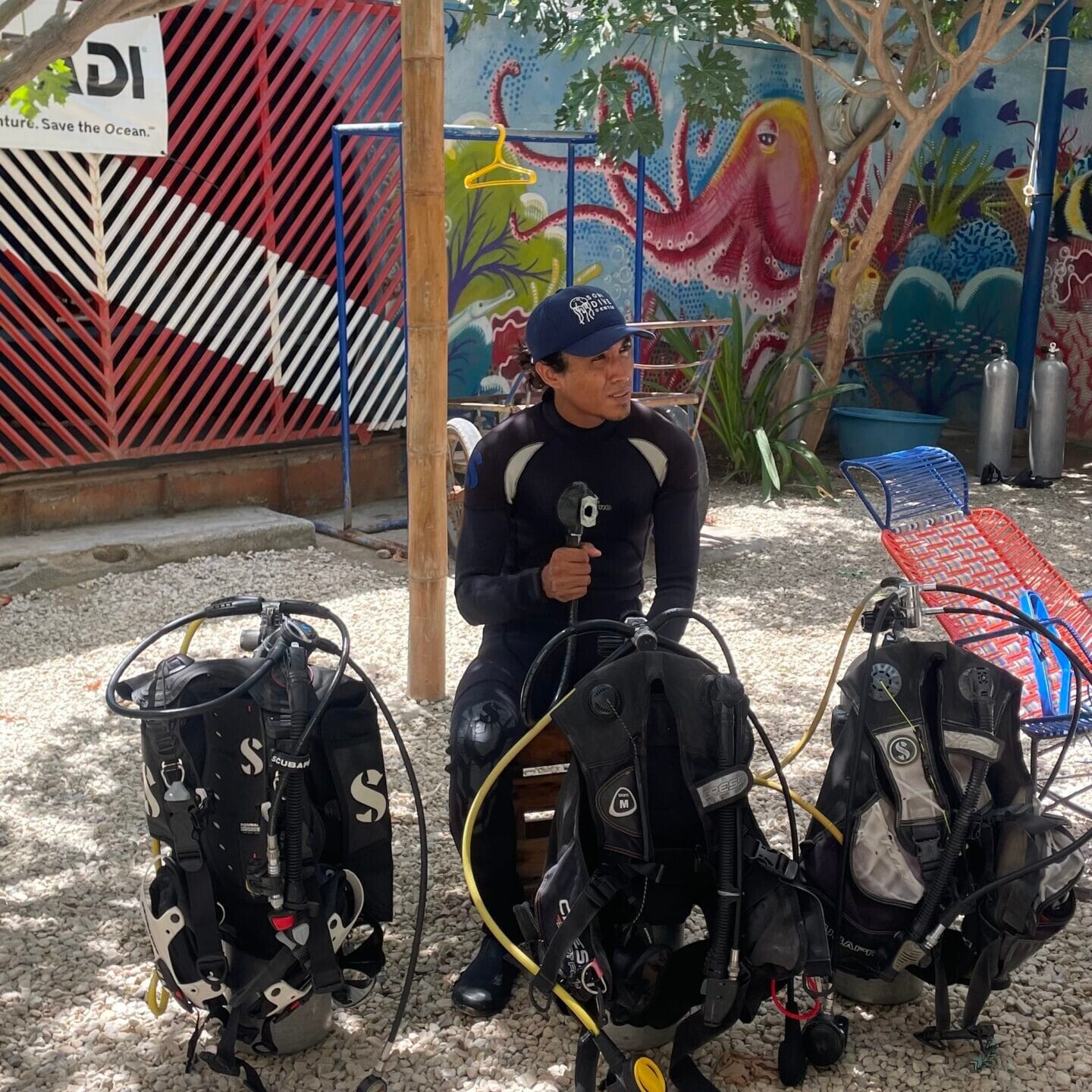 divemaster setting the dive equipment uai