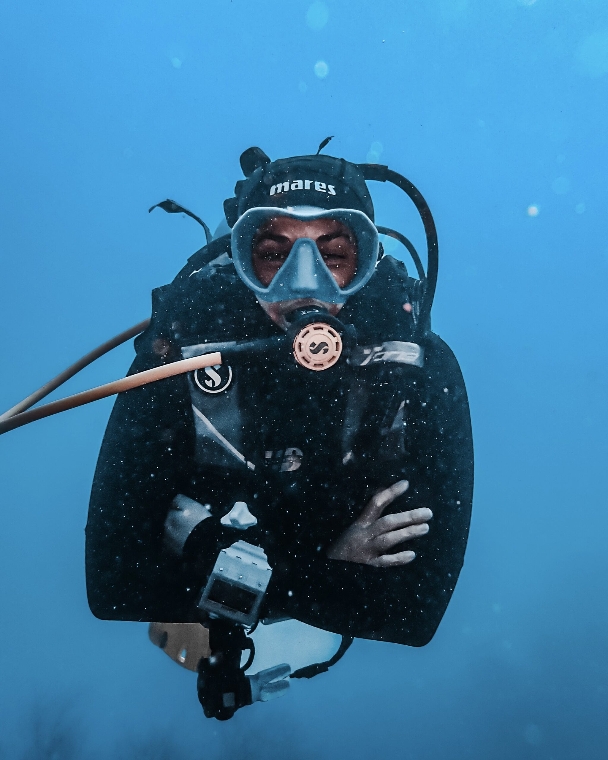 Advanced scuba diver underwater during PADI Advanced Open Water course in Tayrona National Park, Santa Marta Colombia.