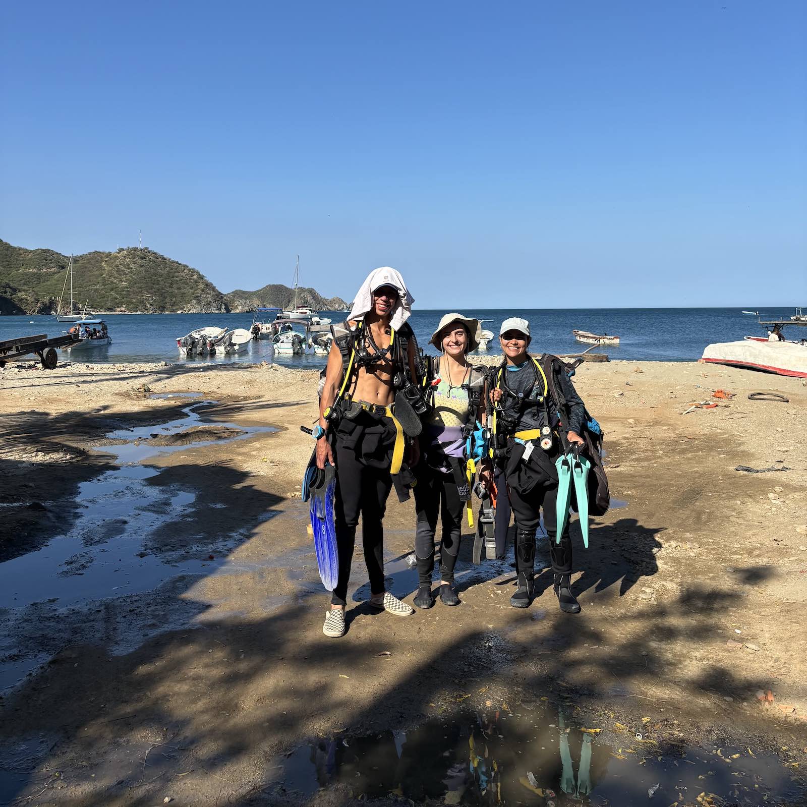 Beginner scuba divers preparing for dive in Taganga Colombia